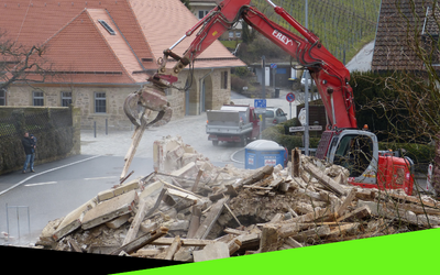 click here to learn more about our demolition services